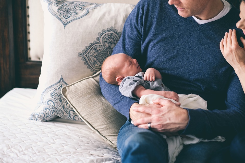 Dad and Newborn Baby