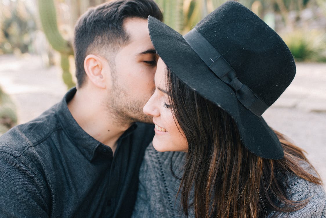 Elevated Kisses are the Best. a Young Man Kissing His Girlfriend while he  is Lifting Her Outdoors. Stock Photo - Image of blond, caucasian: 260638520