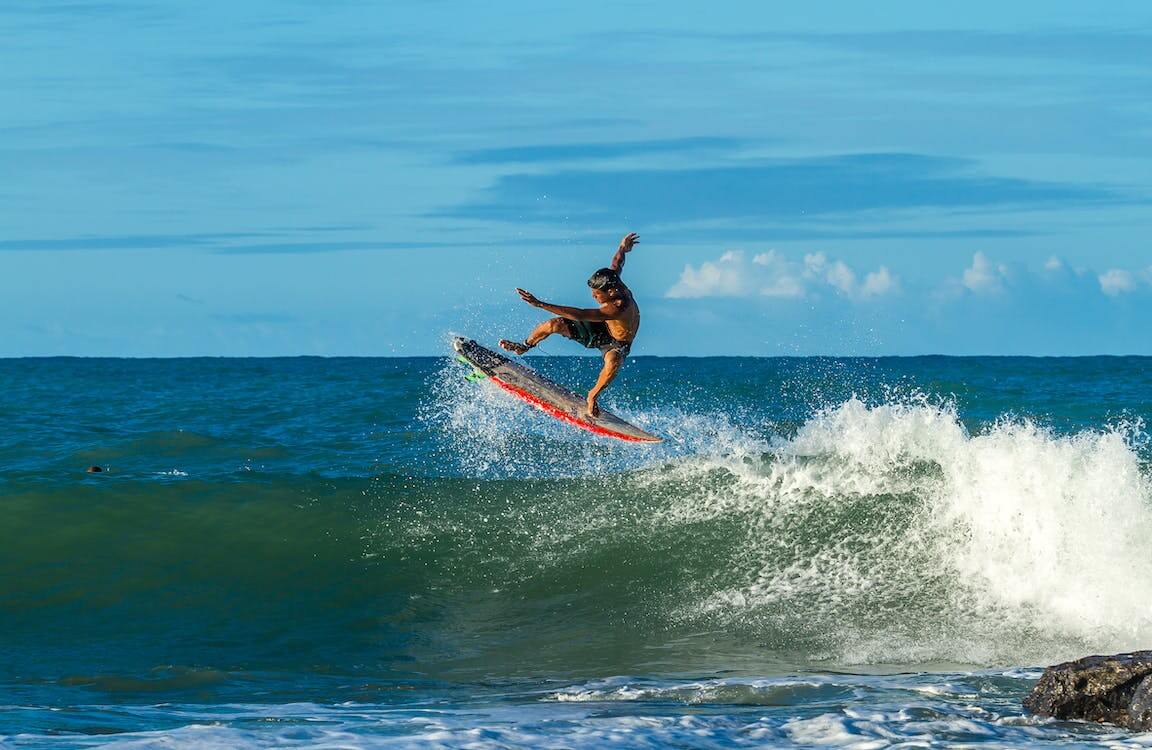 Pose with a surfboard,