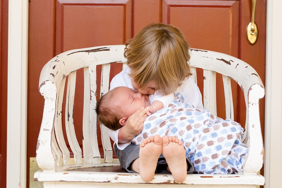 Sibling and Newborn Baby