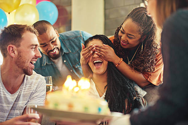 Shot of a young woman celebrating her birthday with her friends