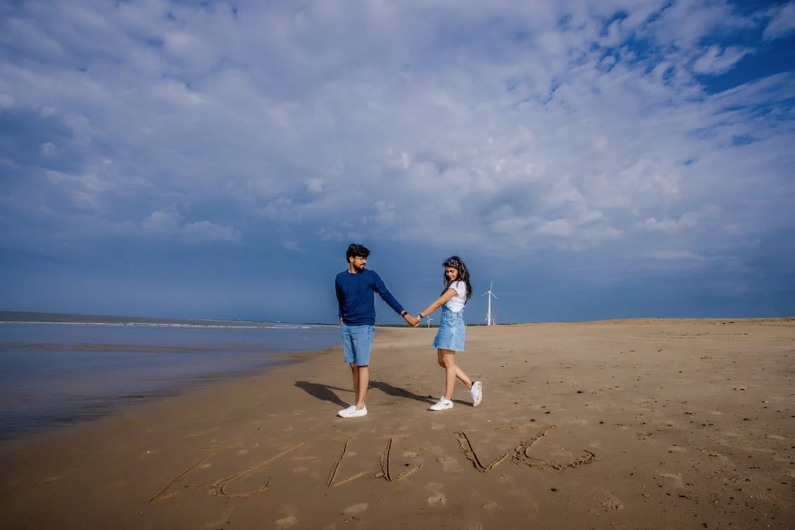 Premium Photo | Couple posing on beach embraced